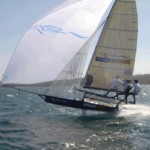 Pegasus Racing, Shark Kahn, Cameron MacDonald, and Geoff Moore sailing an 18 Foot Skiff during the World Championships Sydney Australia 2005.