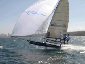 Pegasus Racing, Shark Kahn, Cameron MacDonald, and Geoff Moore sailing an 18 Foot Skiff during the World Championships Sydney Australia 2005.