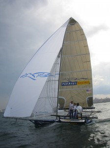 Pegasus Racing, Shark Kahn, Cameron MacDonald, and Geoff Moore sailing an 18 Foot Skiff during the World Championships in Sydney Australia 2005.