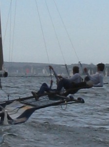 Pegasus Racing, Shark Kahn, Cameron MacDonald, and Geoff Moore sailing an 18 Foot Skiff during the World Championships in Sydney Australia 2005.