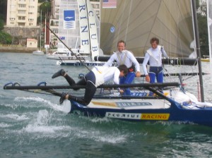 Pegasus Racing, Shark Kahn, Cameron MacDonald, and Geoff Moore sailing an 18 Foot Skiff during the World Championships in Sydney Australia 2005.