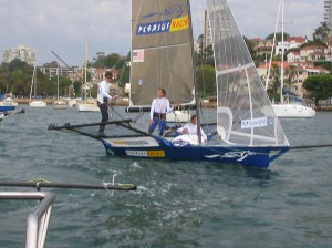 Pegasus Racing, Shark Kahn, Cameron MacDonald, and Geoff Moore sailing an 18 Foot Skiff during the World Championships in Sydney Australia 2005.