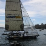 Pegasus Racing, Shark Kahn, Cameron MacDonald, and Geoff Moore sailing an 18 Foot Skiff during the World Championships in Sydney Australia 2005.