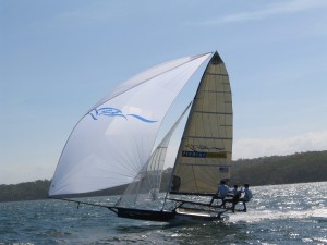 Pegasus Racing, Shark Kahn, Cameron MacDonald, and Geoff Moore sailing an 18 Foot Skiff during the World Championships in Sydney Australia 2005.