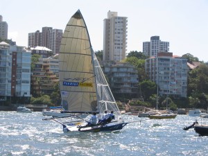 Pegasus Racing, Shark Kahn, Cameron MacDonald, and Geoff Moore sailing an 18 Foot Skiff during the World Championships in Sydney Australia 2005.