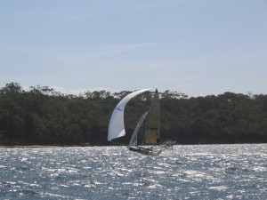 Pegasus Racing, Shark Kahn, Cameron MacDonald, and Geoff Moore sailing an 18 Foot Skiff during the World Championships in Sydney Australia 2005.