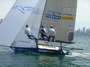 Pegasus Racing, Shark Kahn, Cameron MacDonald, and Geoff Moore sailing an 18 Foot Skiff during the World Championships in Sydney Australia 2005.