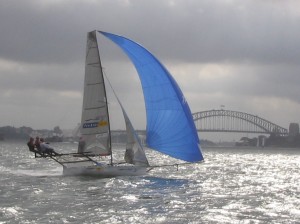 Pegasus Racing, Shark Kahn, Cameron MacDonald, and Geoff Moore sailing an 18 Foot Skiff during the World Championships in Sydney Australia 2005.