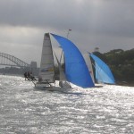 Pegasus Racing, Shark Kahn, Cameron MacDonald, and Geoff Moore sailing an 18 Foot Skiff during the World Championships in Sydney Australia 2005.