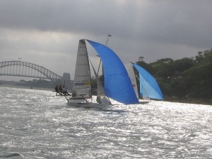 Pegasus Racing, Shark Kahn, Cameron MacDonald, and Geoff Moore sailing an 18 Foot Skiff during the World Championships in Sydney Australia 2005.