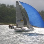 Pegasus Racing, Shark Kahn, Cameron MacDonald, and Geoff Moore sailing an 18 Foot Skiff during the World Championships in Sydney Australia 2005.