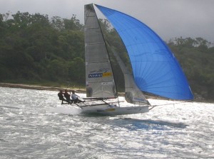 Pegasus Racing, Shark Kahn, Cameron MacDonald, and Geoff Moore sailing an 18 Foot Skiff during the World Championships in Sydney Australia 2005.