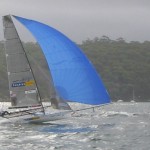 Pegasus Racing, Shark Kahn, Cameron MacDonald, and Geoff Moore sailing an 18 Foot Skiff during the World Championships in Sydney Australia 2005.