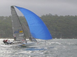 Pegasus Racing, Shark Kahn, Cameron MacDonald, and Geoff Moore sailing an 18 Foot Skiff during the World Championships in Sydney Australia 2005.