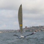 Pegasus Racing, Shark Kahn, Cameron MacDonald, and Geoff Moore sailing an 18 Foot Skiff during the World Championships in Sydney Australia 2005.