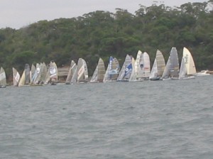 Pegasus Racing, Shark Kahn, Cameron MacDonald, and Geoff Moore sailing an 18 Foot Skiff during the World Championships in Sydney Australia 2005.