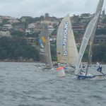 Pegasus Racing, Shark Kahn, Cameron MacDonald, and Geoff Moore sailing an 18 Foot Skiff during the World Championships in Sydney Australia 2005.