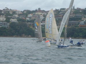 Pegasus Racing, Shark Kahn, Cameron MacDonald, and Geoff Moore sailing an 18 Foot Skiff during the World Championships in Sydney Australia 2005.