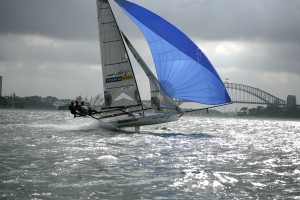 Pegasus Racing, Shark Kahn, Cameron MacDonald, and Geoff Moore sailing an 18 Foot Skiff during the World Championships in Sydney Australia 2005.