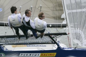 Pegasus Racing, Shark Kahn, Cameron MacDonald, and Geoff Moore sailing an 18 Foot Skiff during the World Championships in Sydney Australia 2005.