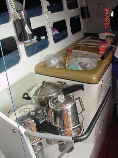 Spartan galley, three camping burners, no microwave or fridge, all frozen and dried food