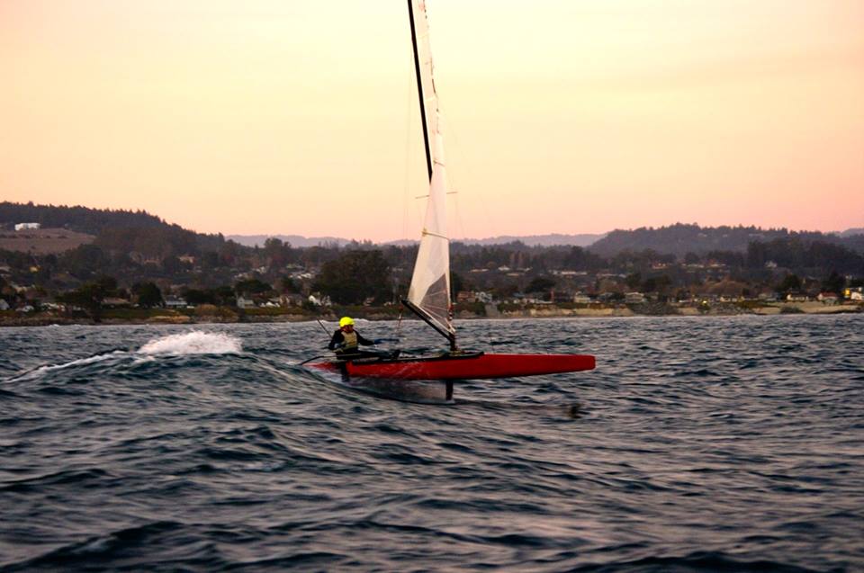 Flying down the face of big swells